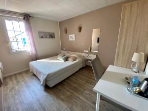 Postel nebo postele na pokoji v ubytování Hotel Abelia