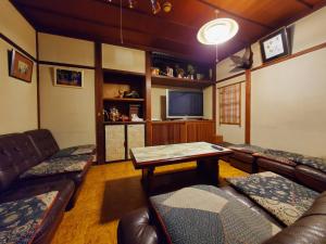 Posezení v ubytování 柏屋旅館＜シェアハウス&ゲストハウス＞