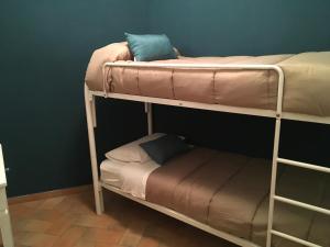 a couple of bunk beds in a room at l'eco dei Papi in Viterbo +3 photos