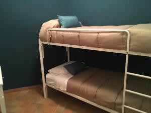 a couple of bunk beds in a room at l'eco dei Papi in Viterbo