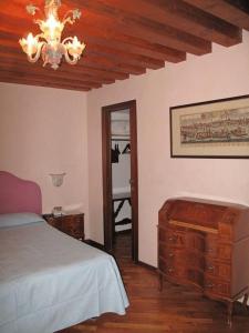 Postel nebo postele na pokoji v ubytování Hotel Piccola Fenice