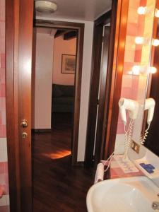 Koupelna v ubytování Hotel Piccola Fenice