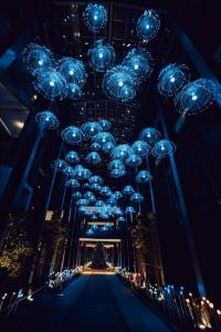 a room with christmas lights and a christmas tree at Cheery Canal Hotel Hangzhou - Intangible Cultural Heritage Hotel in Hangzhou