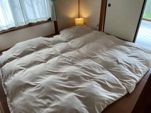 Voodi või voodid majutusasutuse 昭和の家ume toas +26 fotot