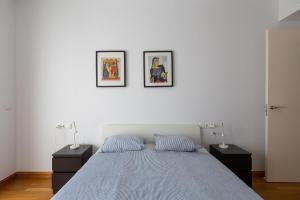 Posteľ alebo postele v izbe v ubytovaní Nice apartment with a sunny terrace
