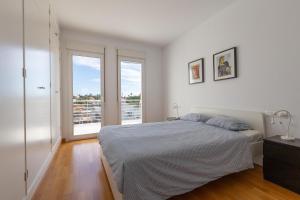 Posteľ alebo postele v izbe v ubytovaní Nice apartment with a sunny terrace + 17 fotografií