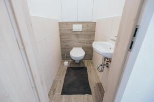 Kúpeľňa v ubytovaní Apartmány u Škraba