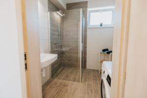 Kúpeľňa v ubytovaní Apartmány u Škraba + 29 fotografií