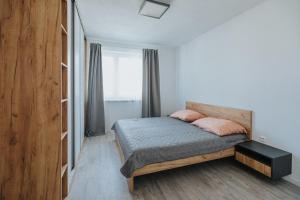 Posteľ alebo postele v izbe v ubytovaní Apartmány u Škraba