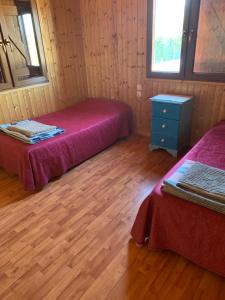 Кровать или кровати в номере casa peninsula caspe 2