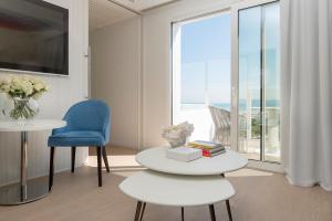 TV a/nebo společenská místnost v ubytování Atlantic Hotel & SPA