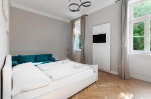 Posteľ alebo postele v izbe v ubytovaní Imperial Apartments Schönbrunn - Contactless Check-In