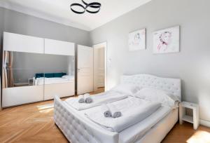 Posteľ alebo postele v izbe v ubytovaní Imperial Apartments Schönbrunn - Contactless Check-In