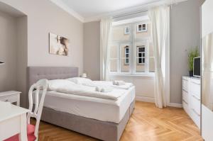 Posteľ alebo postele v izbe v ubytovaní Imperial Apartments Schönbrunn - Contactless Check-In