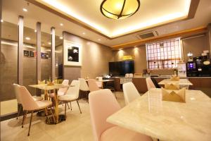 Restavracija oz. druge možnosti za prehrano v nastanitvi Changwon AT Business Hotel