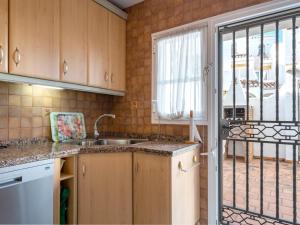 A kitchen or kitchenette at 2 Mijas Playa Club in La Cala de Mijas