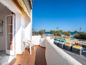 A balcony or terrace at 2 Mijas Playa Club in La Cala de Mijas
