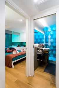 Rúm í herbergi á MC Suite Relax