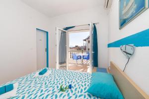 Postel nebo postele na pokoji v ubytování Apartments Ostrog