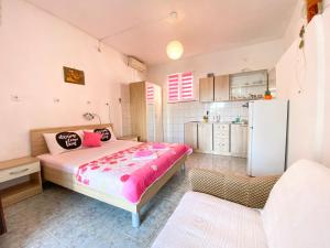 Kuchyň nebo kuchyňský kout v ubytování Apartments Ostrog