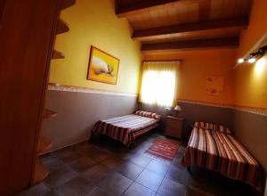Postel nebo postele na pokoji v ubytování Xalet piscina privada Ibiscus + 13 fotografií