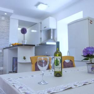 Kuchyňa alebo kuchynka v ubytovaní Apartment Mojaš