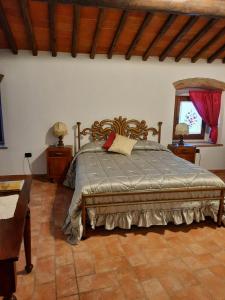 Posteľ alebo postele v izbe v ubytovaní SassoMatto b&b BioAgrituRelax