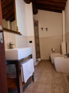 Posteľ alebo postele v izbe v ubytovaní SassoMatto b&b BioAgrituRelax