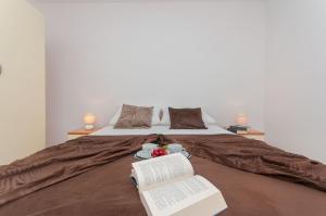 Ein Bett oder Betten in einem Zimmer der Unterkunft Apartmani Joško Duće - Omiš