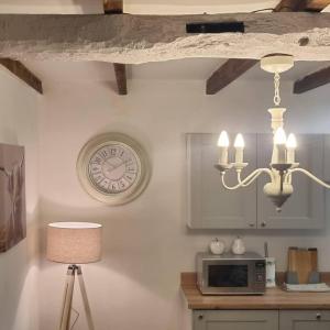 Kuchyň nebo kuchyňský kout v ubytování Denver Cottage + 7 fotografií
