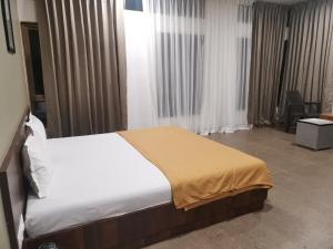 Athang Staycation客房内的一张或多张床位