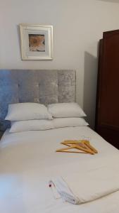 Postel nebo postele na pokoji v ubytování Midtown GuestHouse