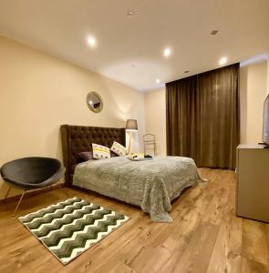 Кровать или кровати в номере Deluxe Old Ungvar Apartments