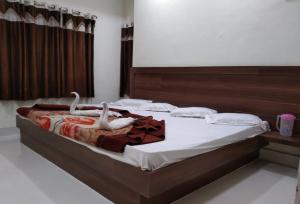 Posteľ alebo postele v izbe v ubytovaní Sahiba Palace