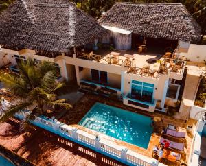 an aerial view of a villa with a swimming pool at Mambo Paradise in Matemwe
