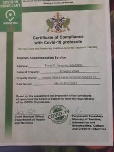 un certificado de conformidad con los protocolos ipd covalentes en un documento en Amazon Villas, en Soufrière