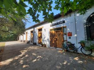 a building with a bike parked outside of it at Errotazar apartamento rural K in Alsasua