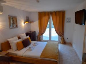 Postel nebo postele na pokoji v ubytování Hotel Villa Maya