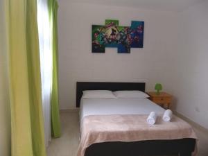 Nirvana House Calima Darien客房内的一张或多张床位