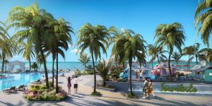 un groupe de personnes se promenant autour d'un complexe avec des palmiers dans l'établissement Sandals Royal Bahamian All Inclusive - Couples Only, à Nassau