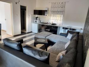 Kuchyňa alebo kuchynka v ubytovaní Corner Apartman 5