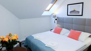 Łóżko lub łóżka w pokoju w obiekcie Hotel Rezydencja AS & Spa-Najwyżej w Karpaczu