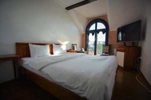 Ένα ή περισσότερα κρεβάτια σε δωμάτιο στο Gala - Guesthouse