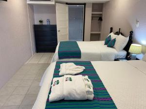 Voodi või voodid majutusasutuse La Isla Resort toas