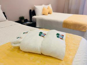 Voodi või voodid majutusasutuse La Isla Resort toas
