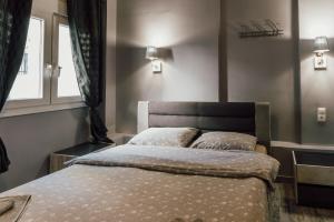 Posteľ alebo postele v izbe v ubytovaní Lef Lodging