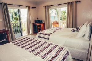Voodi või voodid majutusasutuse La Isla Resort toas