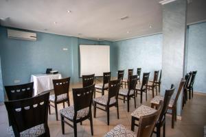 A área empresarial e/ ou a sala de conferências de Hotel Etoile Du Nord