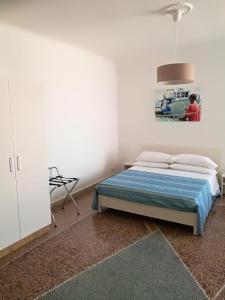 Postel nebo postele na pokoji v ubytování SETTIMO SOLE Affitta Camere