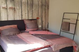Postel nebo postele na pokoji v ubytování City-Appartment schick, Einzelgarage inkl